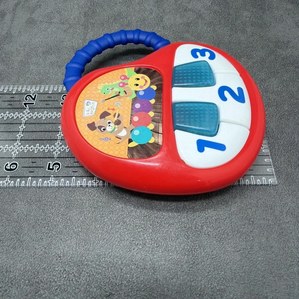 Baby Einstein Keys To Discover Play Mini Handheld Piano